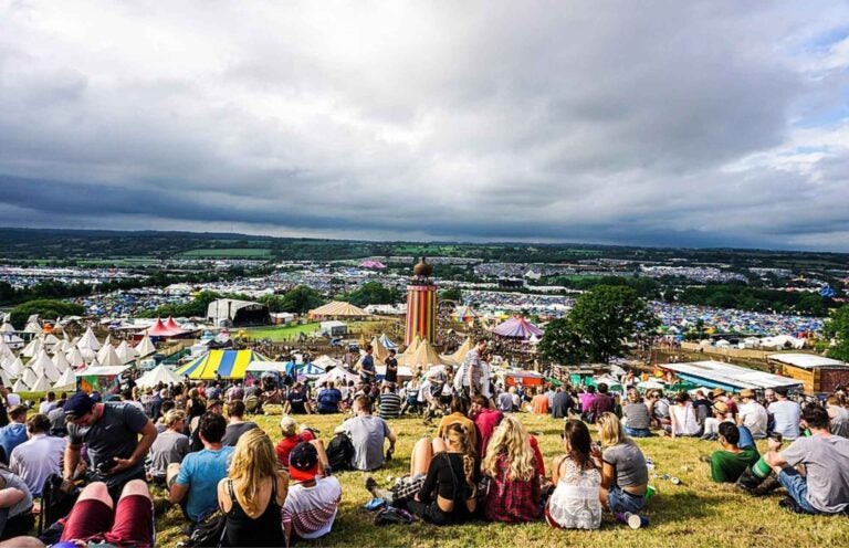 Crowd gathered at the highest point in the farm at Glastonbury festival