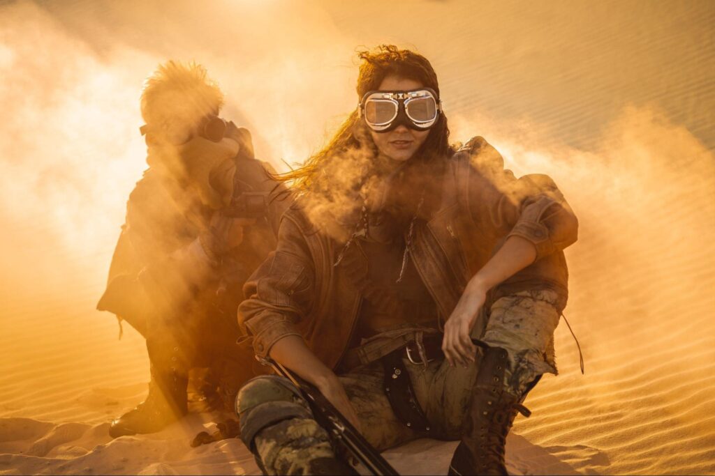 a girl in the desert dressed up for burning man festival