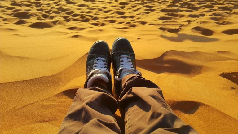 a travel in the sand in the sahara desert