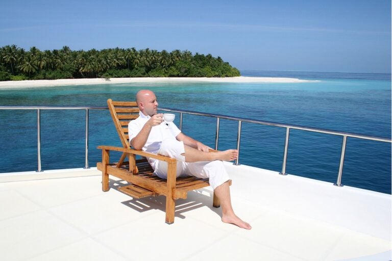 a tourist relaxing in the maldives off season