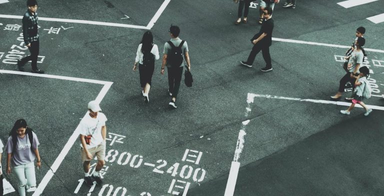 An aerial view of pedestrians crossing a street in Taiwan.