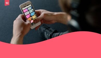 man using spotify on his phone