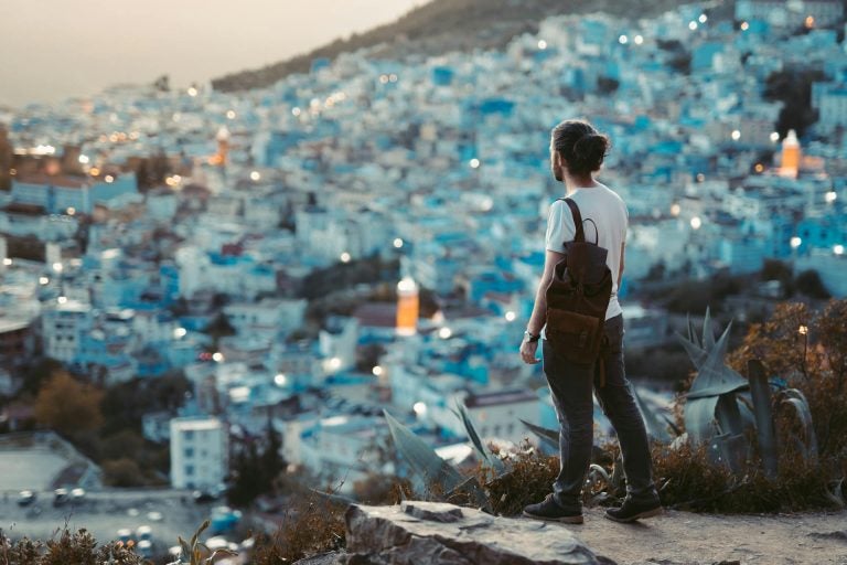 visitor seeing Chefchaouen from a hill