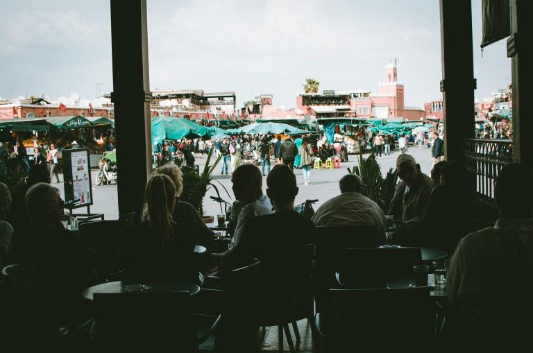 travelers sitting in a restaurant in morocco