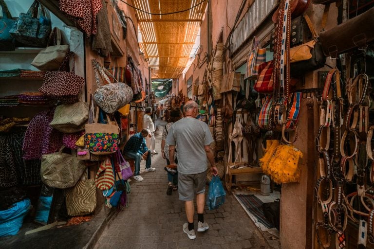 travelers walking in marrakech