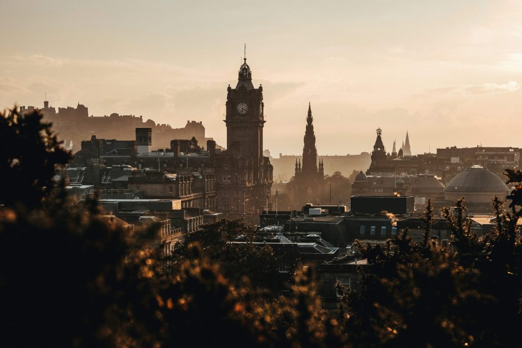 Edinburgh City captured from Calton Hill on a cold, misty evening as the sun set.