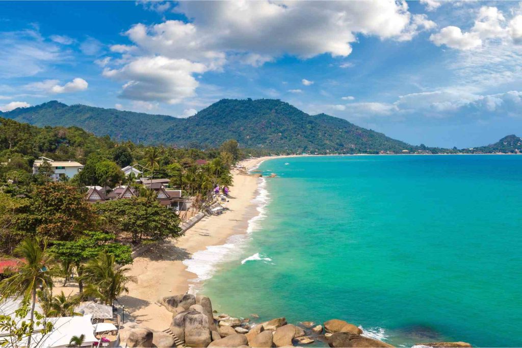 Lamai beach with lush mountains in the background