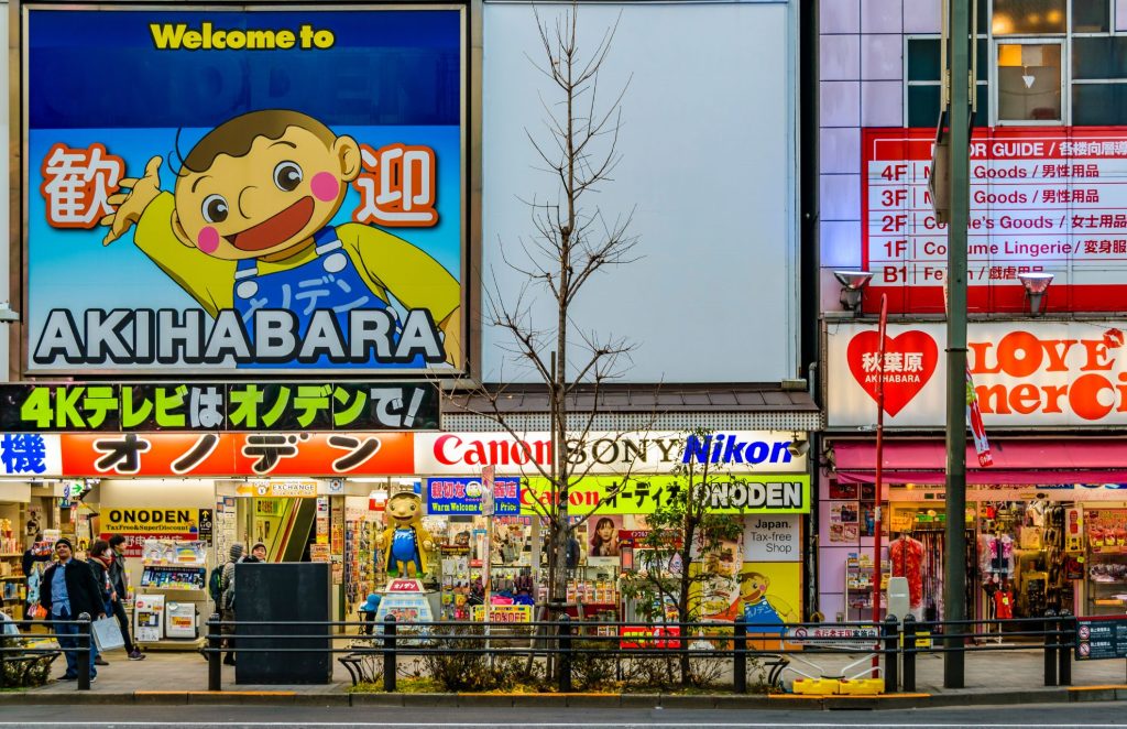 Akihabara district filled with the bright lights of the store fronts 