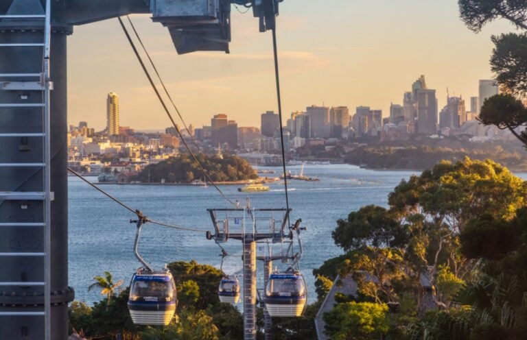 Cable car over Taronga Zoo with Sydney Harbour in the background.
