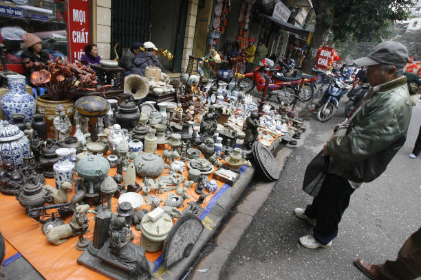 Antiques display on a pavement stall in Hanoi Old Quarter; Source: Getty Images