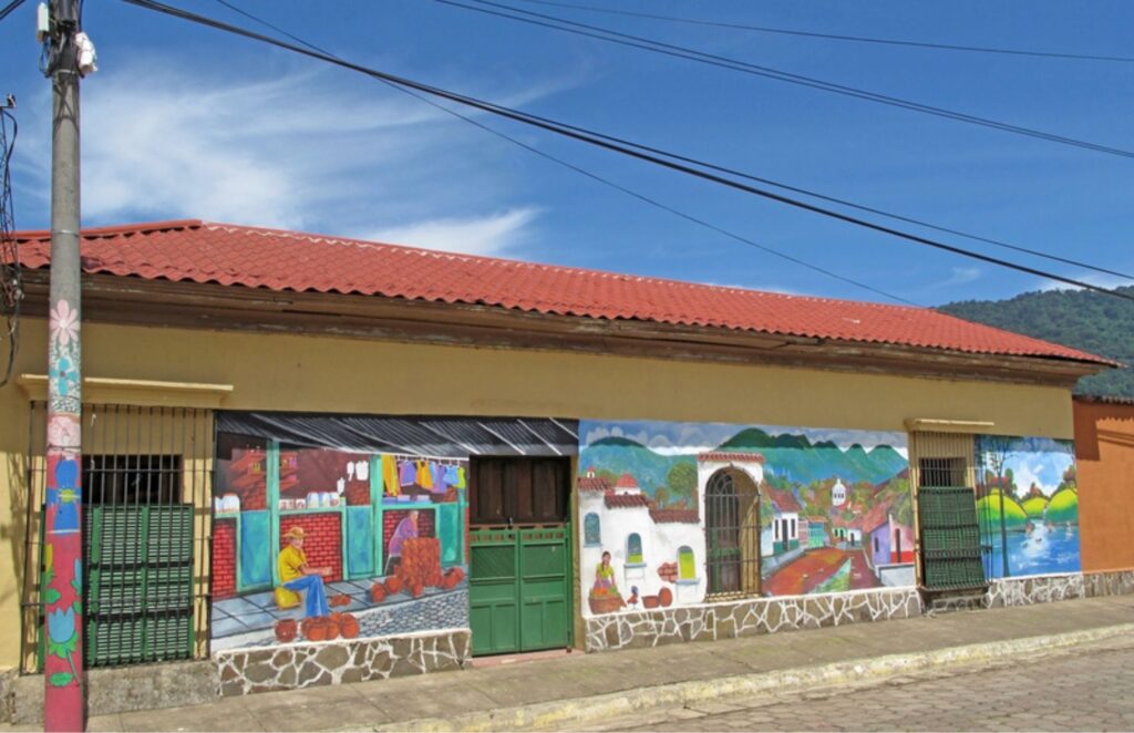 Mural paintings on house, Ruta De Las Flores