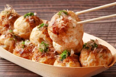 Takoyaki are crunchy, savory bites that you must try when in Tokyo