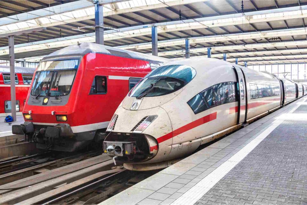 Two trains standing at a train station in Germany.