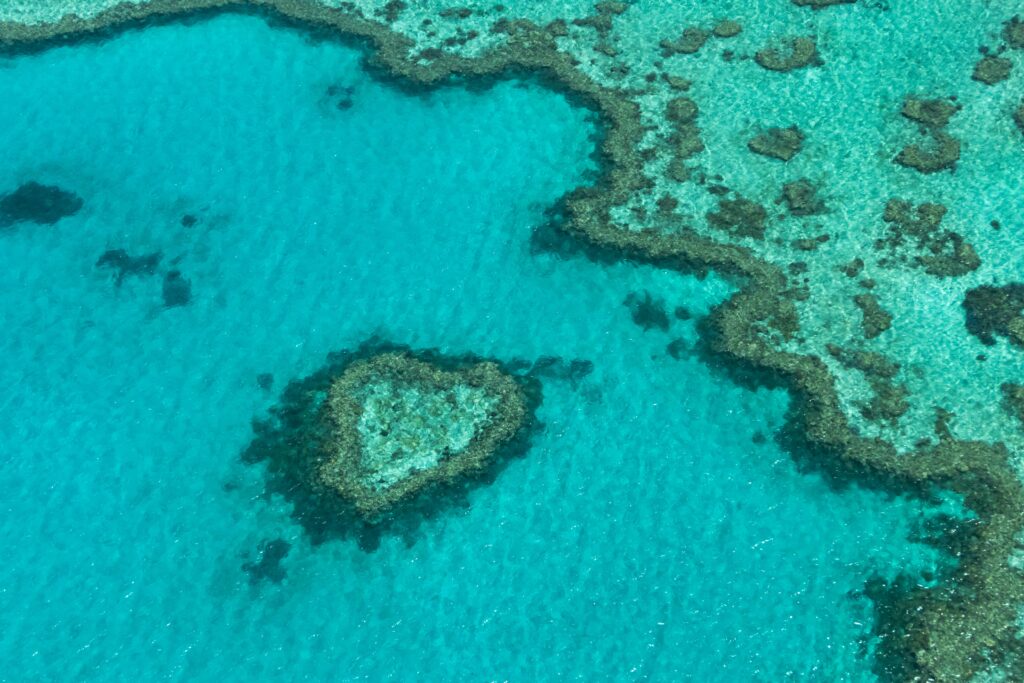 Stunning aerial view of the iconic Heart Reef, a natural wonder within Australia's Great Barrier Reef