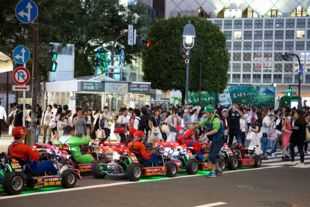 Tourists on an evening Super Mario kart ride