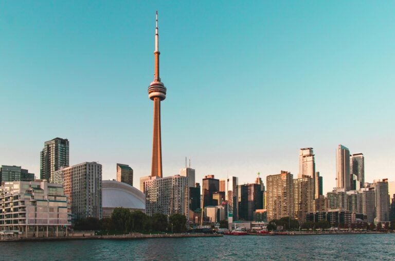 The skyline of Toronto, Canada, as seen from across a body of water.