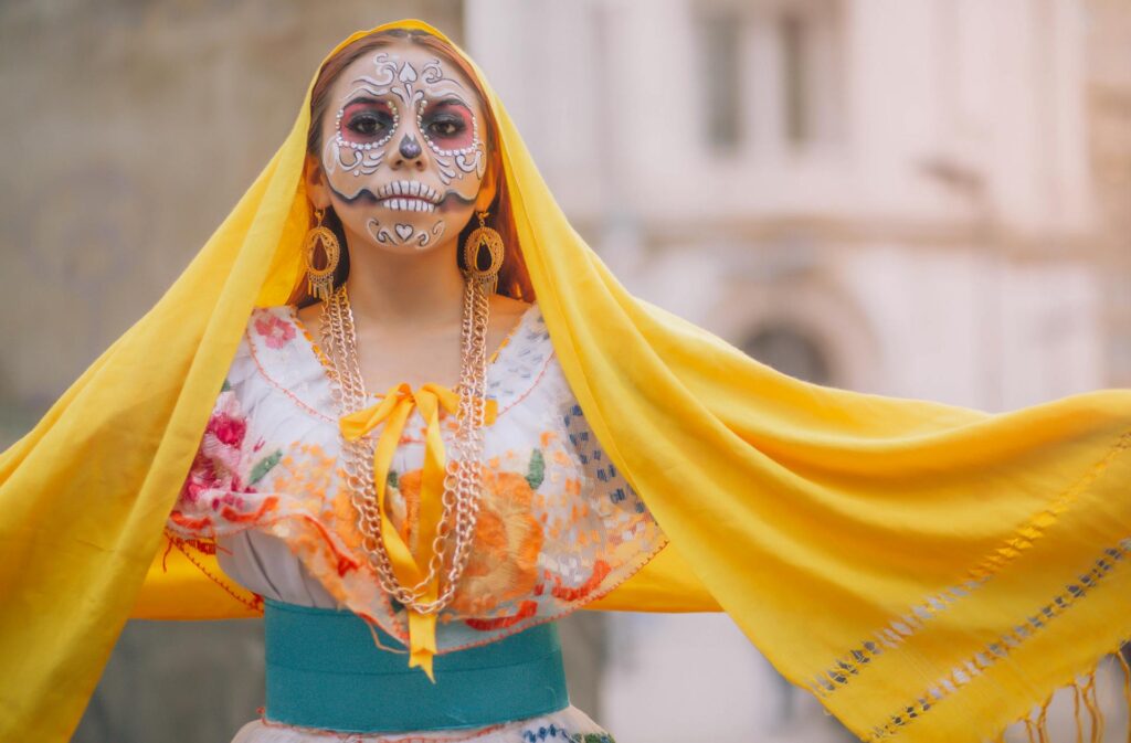 Traditional catrina makeup during the Día de los Muertos celebration
