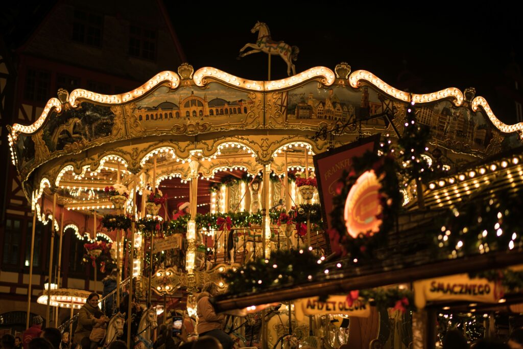 An illuminated carousel at Frankfurt Christmas Market.