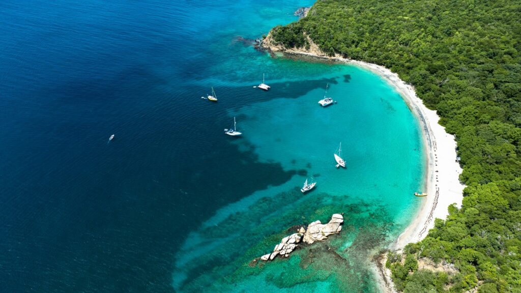 Deep blue and teal waters surround the island of Grenada 