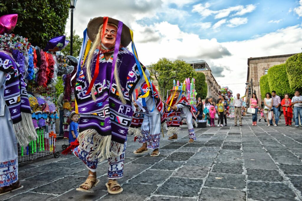 locals dressed with traditional costumes celebrating the carnival