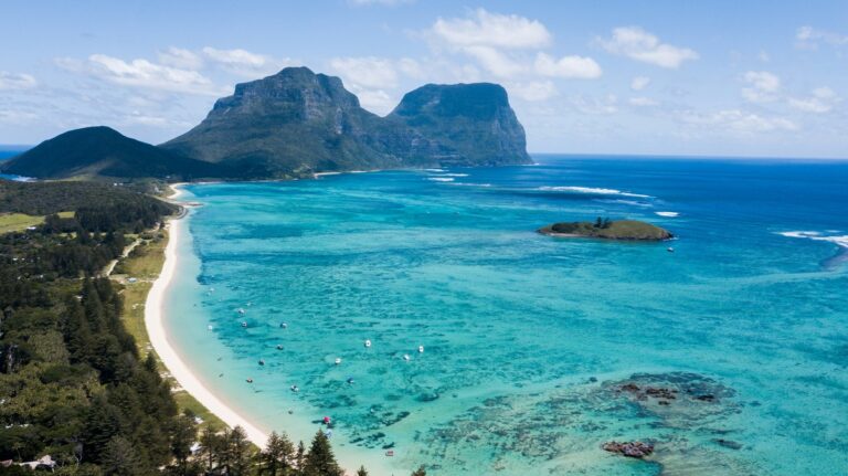 Blue waters and a sandy shoreline in Lord Howe Island