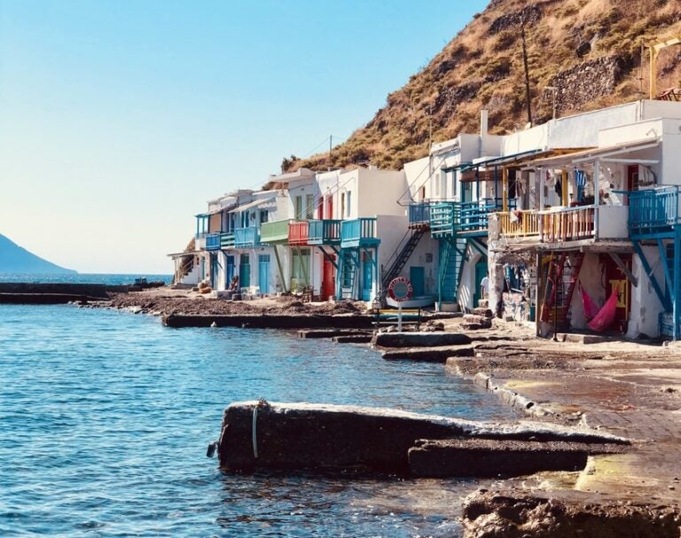 Colorful waterfront houses that fishermen use to store their wooden boats in the winter 