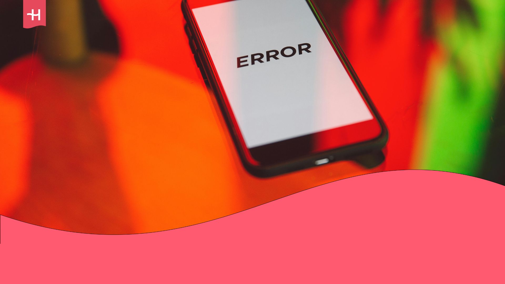 A black smartphone displaying the word "error" on the screen.