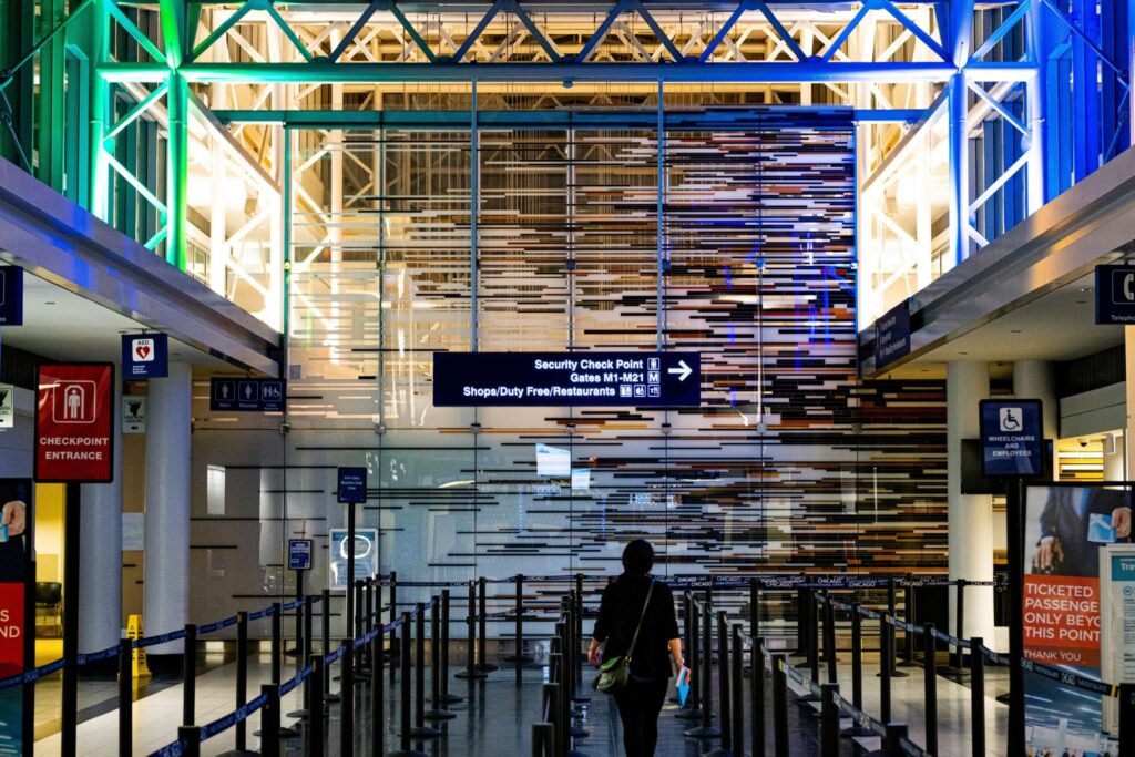 Walking toward security check point at the airport; Source: Pexels