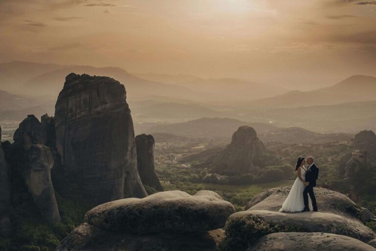 A newlywed couple in the greek mountains