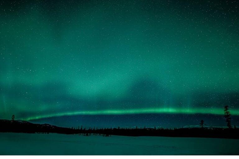 Shot of the Northern Lights and stars in the Yukon Territory.