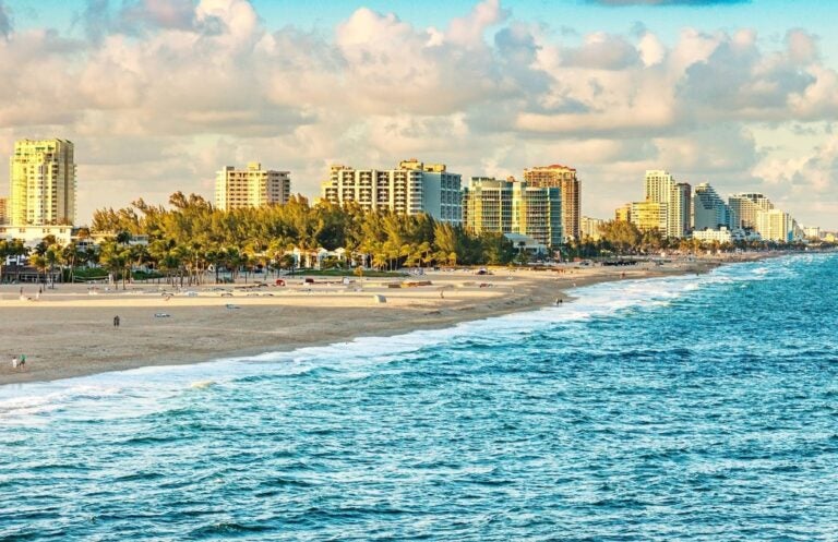 Golden hour at Fort Lauderdale beach with a sunset tinge on the buildings 