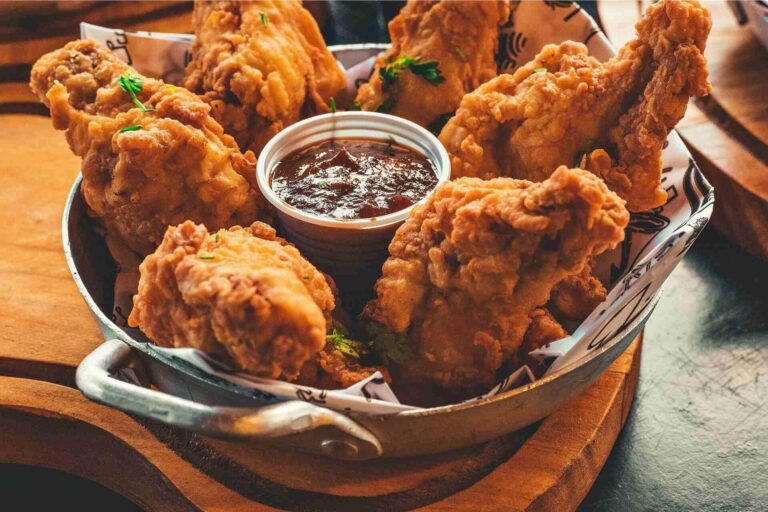 Fried chicken served in a metal bowl