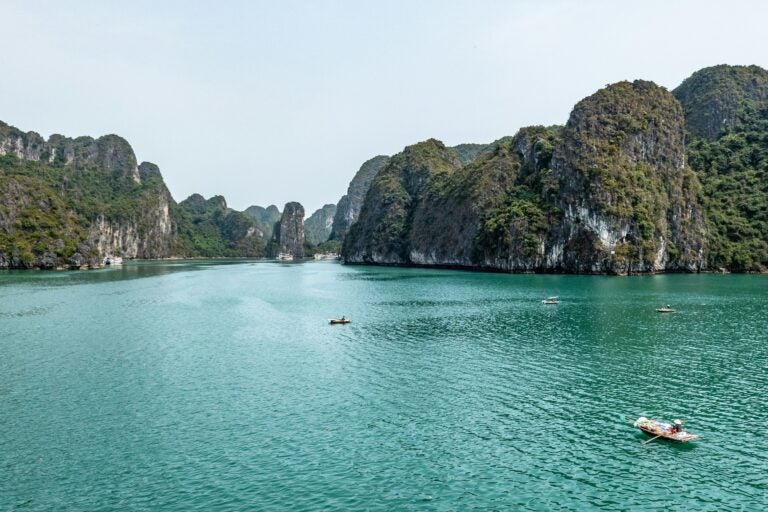 View of the crystal clear waters and picturesque landscape of Ha Long Bay, Northern Vietnam.
