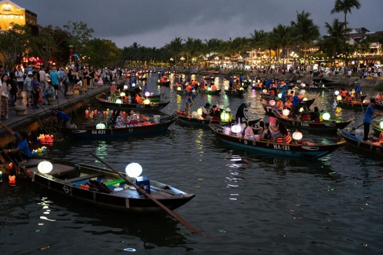 Boats gather on the river to celebrate the Lantern Festival in Vietnam.