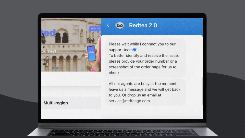 A laptop displaying RedteaGO's chat bot that helps its website users seek support for technical issues.