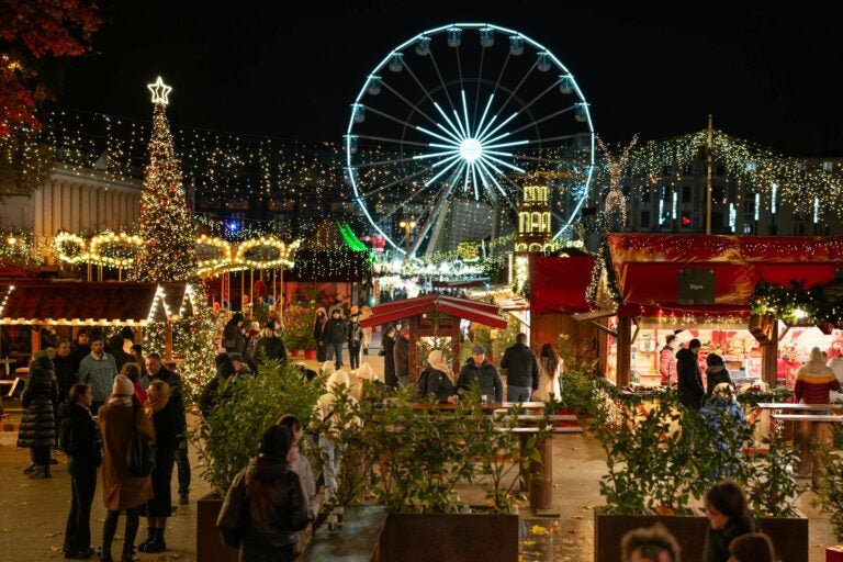 The Krakow Christmas markets, complete with stalls and the ferris wheel in the background.