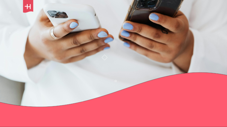 A woman is standing while holding a white smartphone in her right hand and a black smartphone in her left hand. She is trying to decide which phone to choose.