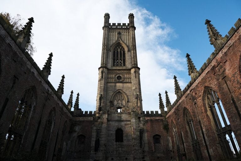 the rustic structure of the bombed-out church bell tower - a remnant of World War 2 in Liverpool