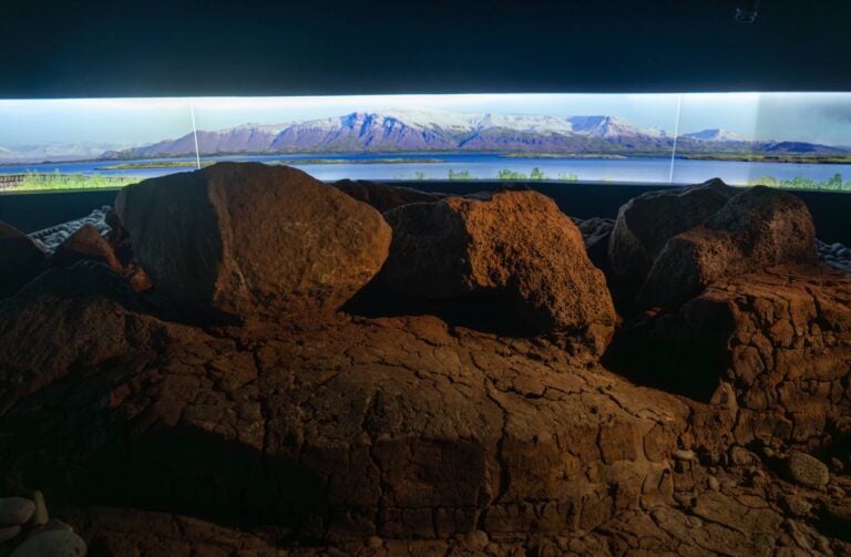 Exhibition in the Perlan Museum with an icelandic landscape in the back