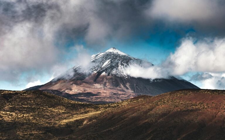 Mount Teide, the biggest mountain in Spain, seen from a nearby valley