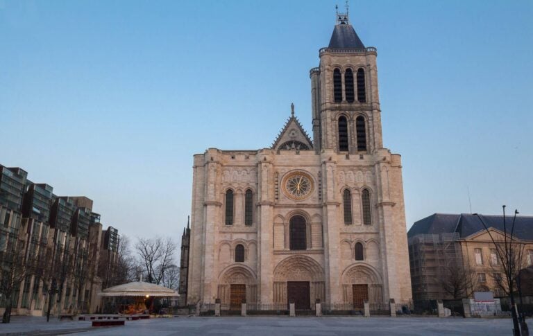 iconic saint-denis cathedral and traditional surrounding buildings