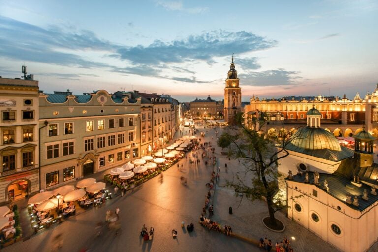 The city of Krakow at dusk.