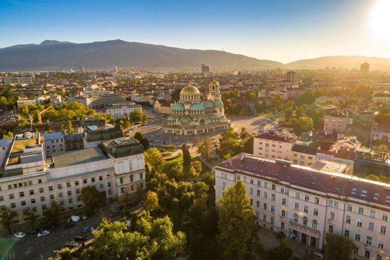 The city of Sofia and surrounding mountains.