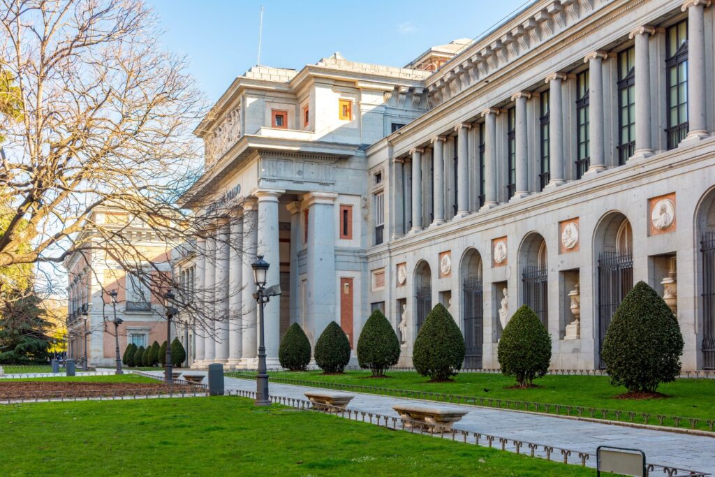 Side view of the Prado Museum in Madrid during the day.