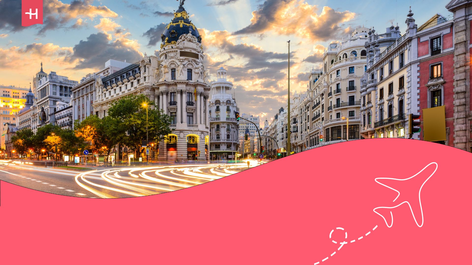 City of Madrid on a cloudy afternoon with lights from cars rushing by captured. Holafly log on the top left corner and an illustration of an aeroplane on the bottom right corner.