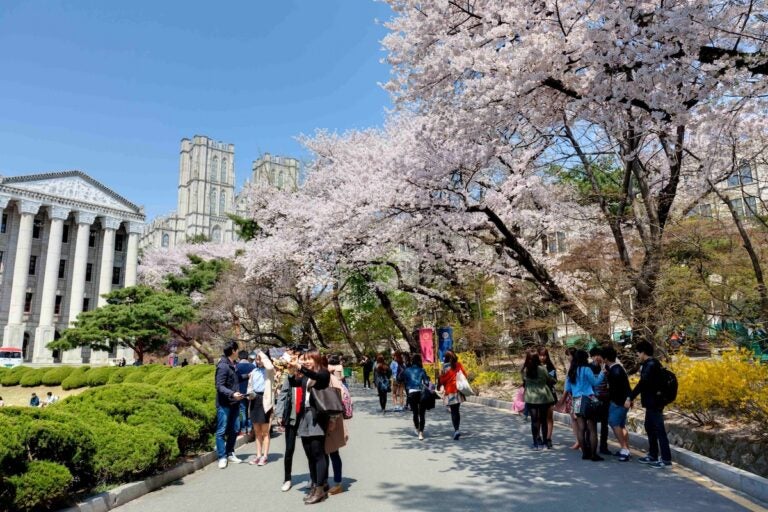 Students walking through the Kyung Hee University campus in Seoul, South Korea.