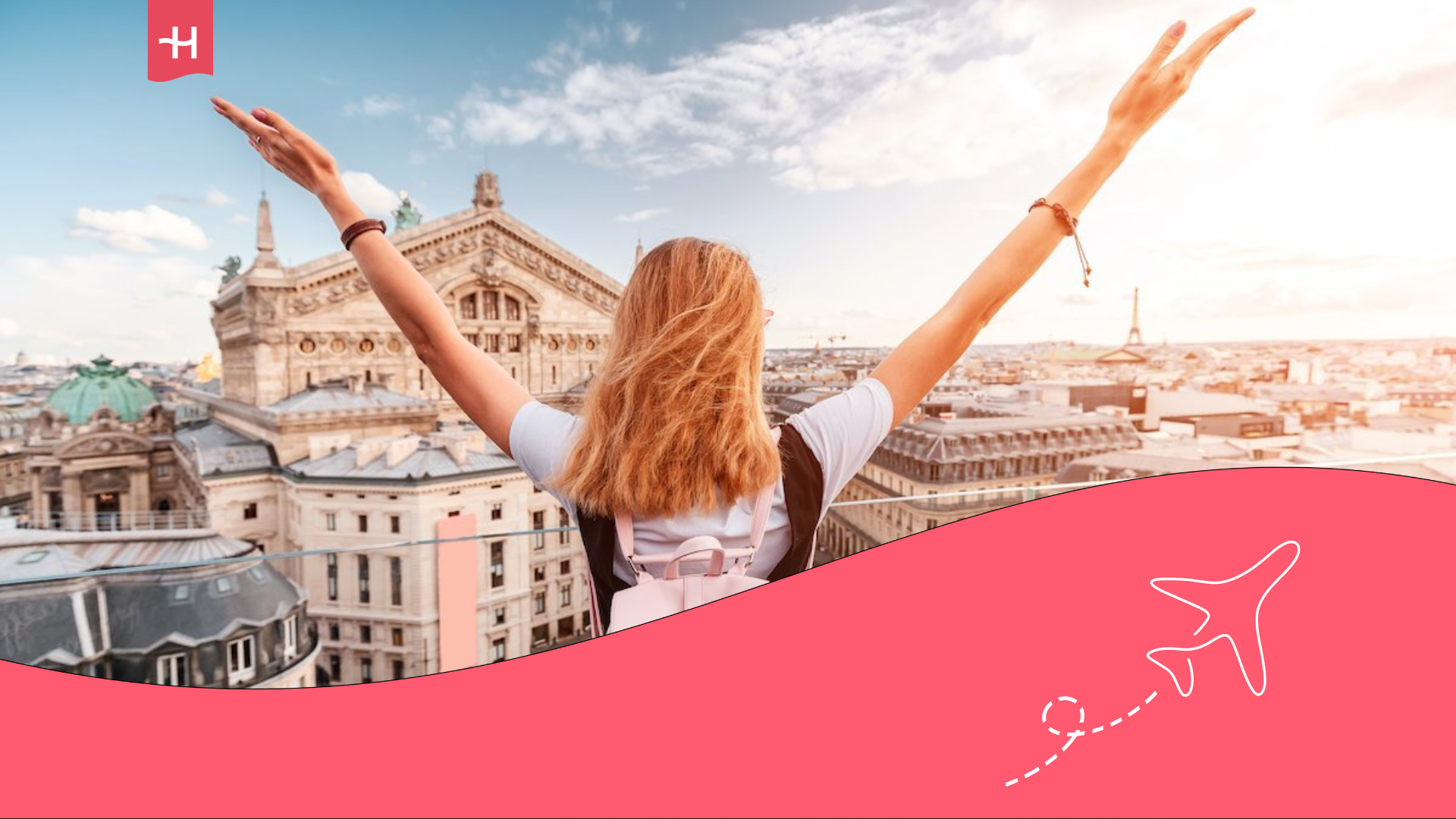 A female exchange program student watches Paris' city landscape with her back turned and both arms raised