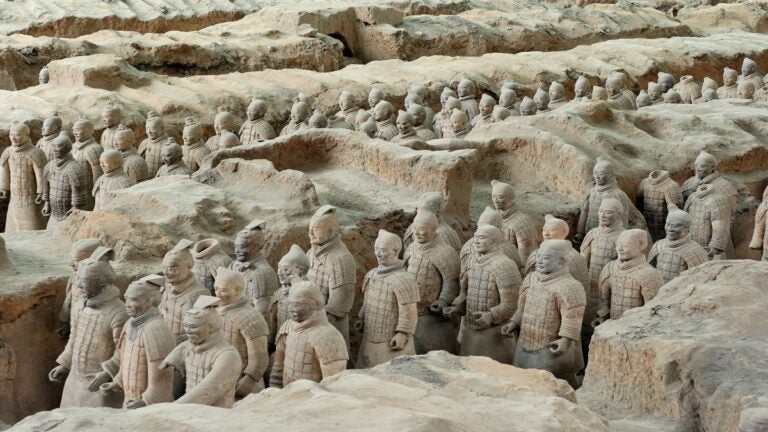 life-sized clay warriors surrounding a tomb