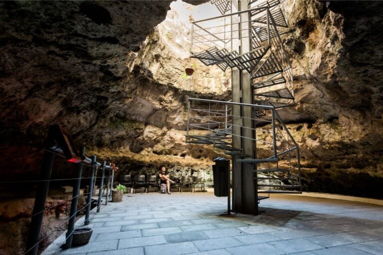 The inside (showing stairs to climb in and out) of the world's smallest volcano, Cuexcomate, Mexico.