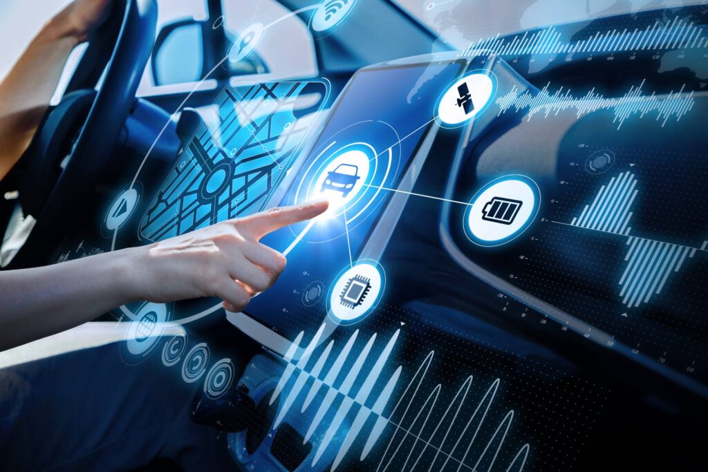 people using a touch screen in their car to access services